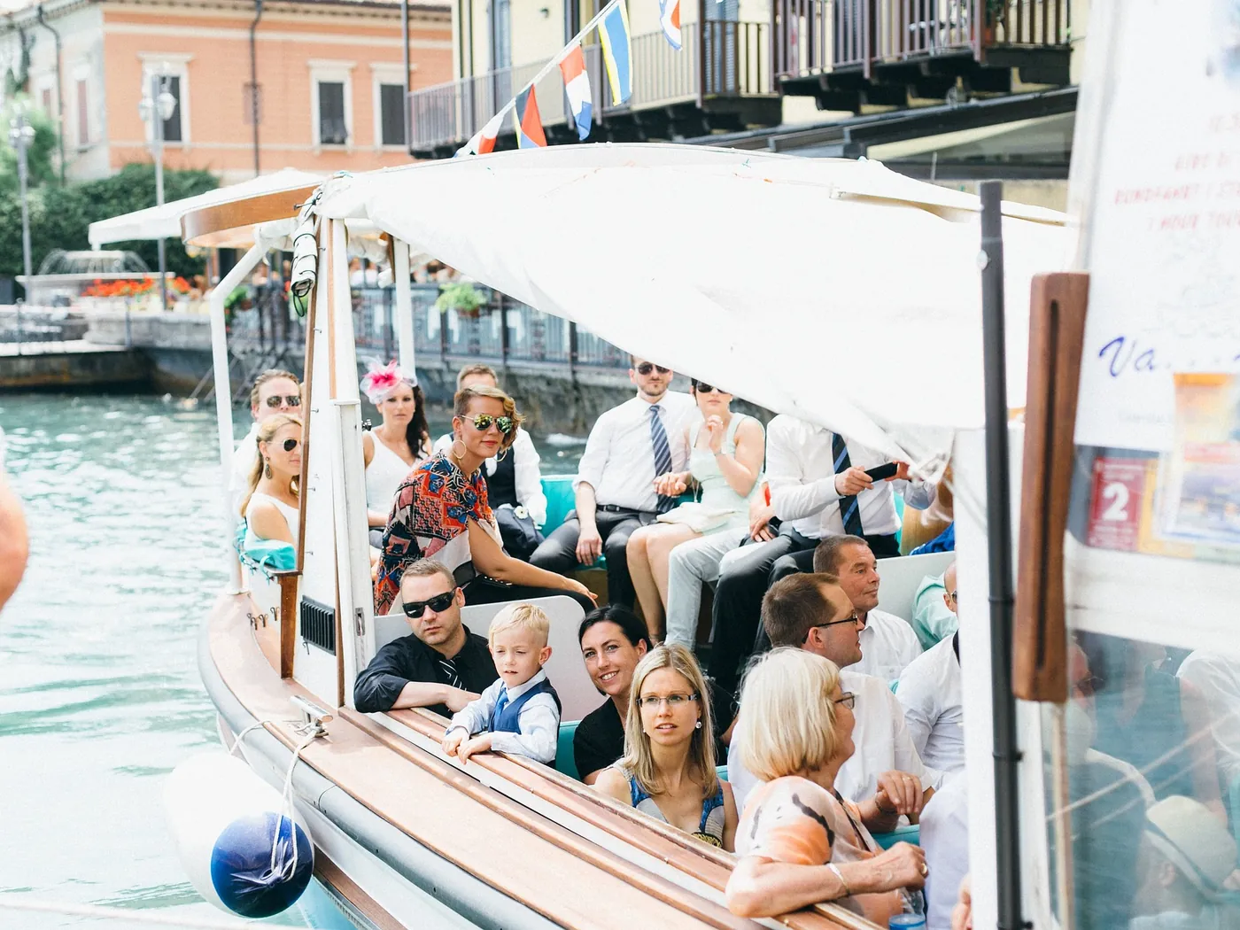 Wedding guests arriving together by boat